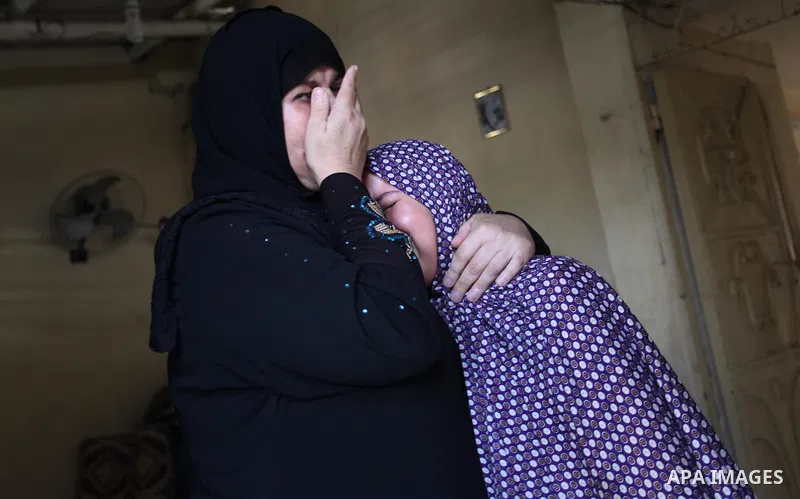 Relatives of two-year-old Palestinian girl Rahaf, mourn during the funeral of the toddler and her pregnant mother on October 11, 2015, at the al-Nusairat refugee camp, in central Gaza Strip. A pregnant Palestinian mother...