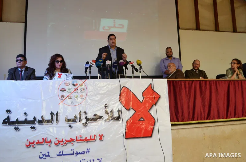 Egyptian actress Athar al-Hakim, takes part in the campaign of 'No to religious parties', in Cairo on October 11, 2015. Liberal activists and politicians in Egypt launched a campaign aimed at driving the public away from...