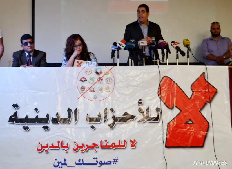 Egyptian actress Athar al-Hakim, takes part in the campaign of 'No to religious parties', in Cairo on October 11, 2015. Liberal activists and politicians in Egypt launched a campaign aimed at driving the public away from...