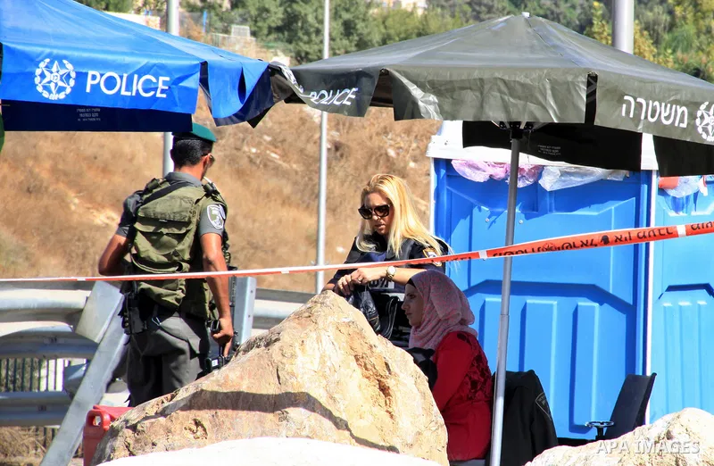 Israeli police stand guard at a checkpoint in Jerusalem's Old city on October 14, 2015. Seven Israelis and 30 Palestinians, including children and assailants, have been killed in two weeks of bloodshed in Israel, Jerusal...