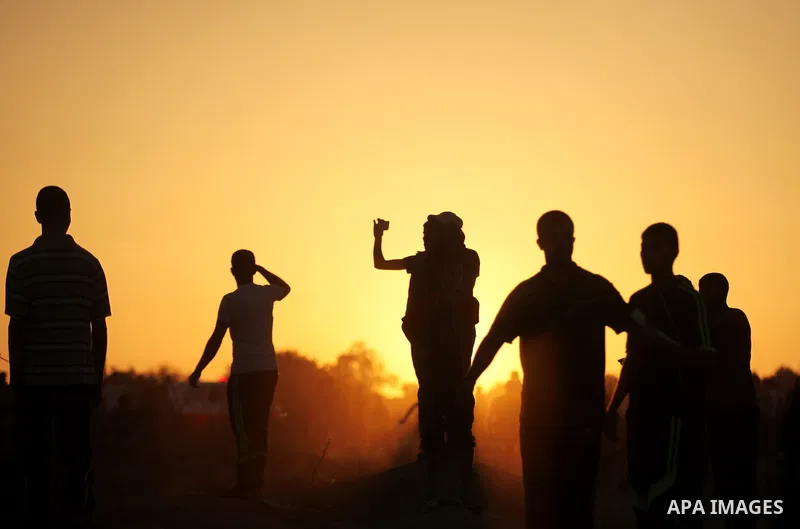 Palestinian protesters clash with Israeli troops near the border between Israel and central Gaza Strip October 15, 2015. Thirty-two Palestinians and seven Israelis have been killed in the past two weeks of bloodshed. The...