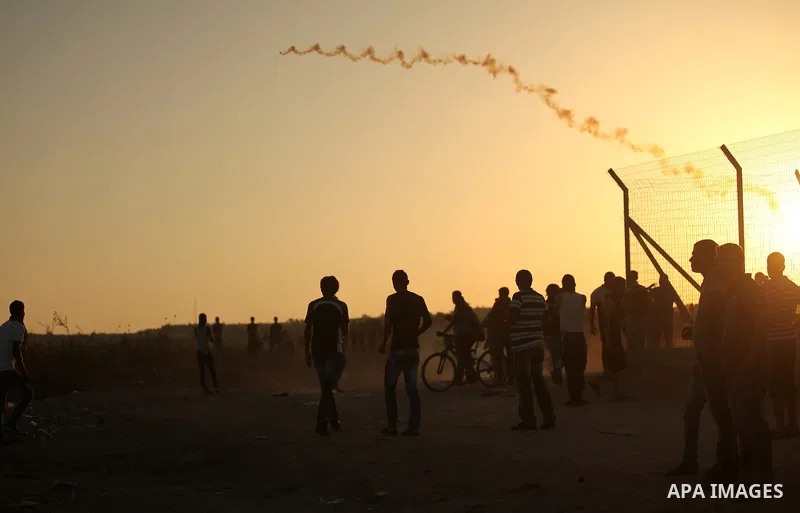 Palestinian protesters clash with Israeli troops near the border between Israel and central Gaza Strip October 15, 2015. Thirty-two Palestinians and seven Israelis have been killed in the past two weeks of bloodshed. The...