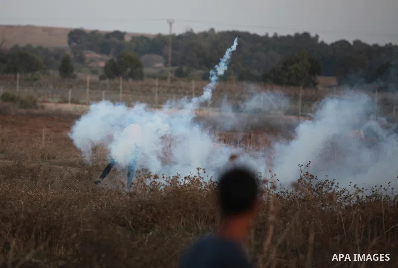 Palestinian protesters clash with Israeli troops near the border between Israel and central Gaza Strip October 15, 2015. Thirty-two Palestinians and seven Israelis have been killed in the past two weeks of bloodshed. The...