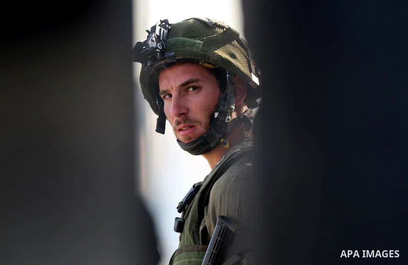 A member of Israeli security forces looks on during clashes with Palestinian protesters at the main entrance of the West Bank city of Bethlehem on October 16, 2015. The unrest that has engulfed Jerusalem and the occupied...
