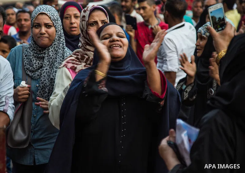 Egyptian Muslim Sufis march during a parade through the streets during a ceremony to celebrate the Islamic new year, in Cairo on October 16, 2105. Photo by Amr Sayed