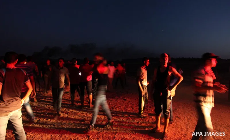 Palestinian protesters clash with Israeli security forces near the border between Israel and Central Gaza Strip east of Bureij on October 17, 2015. At least 40 Palestinians and seven Israelis have died in more than two w...