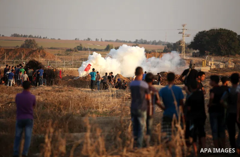 Palestinian protesters clash with Israeli security forces near the border between Israel and Central Gaza Strip east of Bureij on October 17, 2015. At least 40 Palestinians and seven Israelis have died in more than two w...
