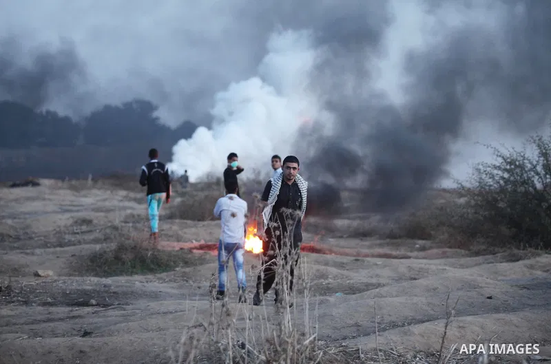 Palestinian protesters clash with Israeli security forces near the border between Israel and Central Gaza Strip east of Bureij on October 17, 2015. At least 40 Palestinians and seven Israelis have died in more than two w...