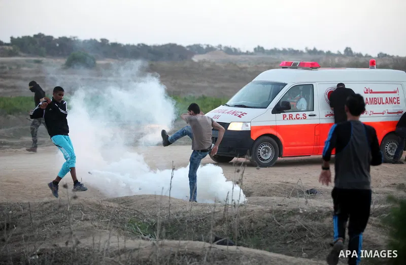Palestinian protesters clash with Israeli security forces near the border between Israel and Central Gaza Strip east of Bureij on October 17, 2015. At least 40 Palestinians and seven Israelis have died in more than two w...