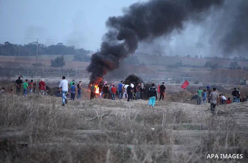 Palestinian protesters clash with Israeli security forces near the border between Israel and Central Gaza Strip east of Bureij on October 17, 2015. At least 40 Palestinians and seven Israelis have died in more than two w...