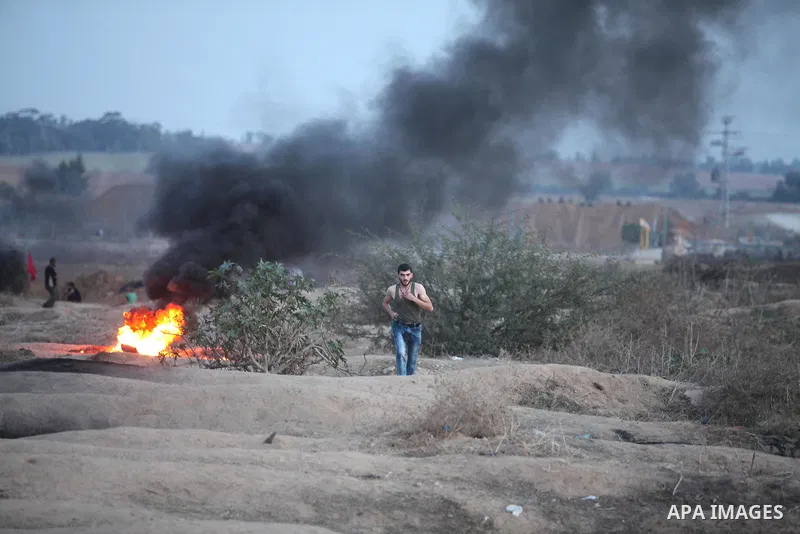 Palestinian protesters clash with Israeli security forces near the border between Israel and Central Gaza Strip east of Bureij on October 17, 2015. At least 40 Palestinians and seven Israelis have died in more than two w...