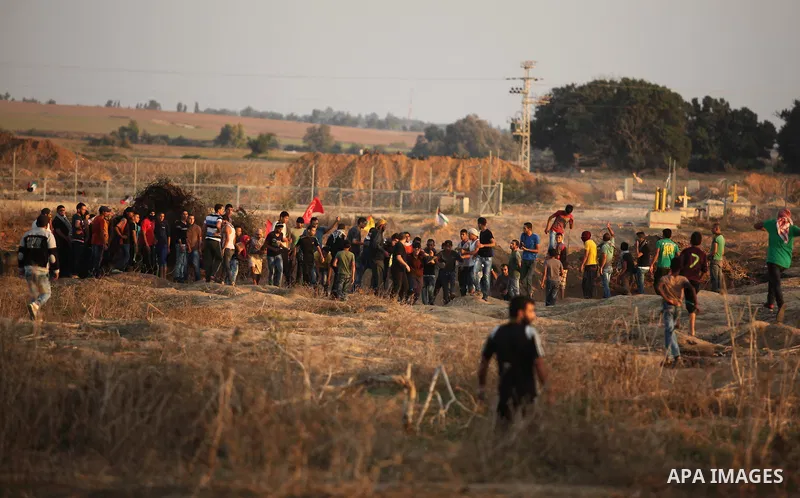 Palestinian protesters clash with Israeli security forces near the border between Israel and Central Gaza Strip east of Bureij on October 17, 2015. At least 40 Palestinians and seven Israelis have died in more than two w...