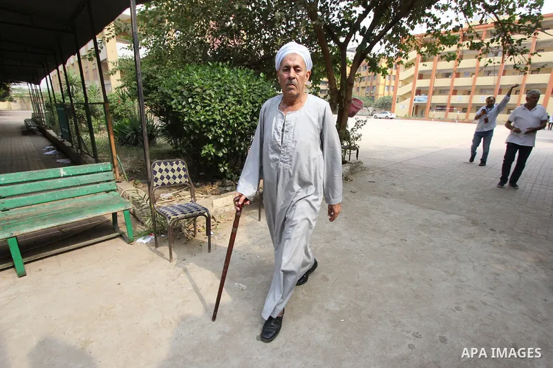 An Egyptian man casts his ballot in the Egyptian parliamentary elections at a polling station in the Al-Ayyat area of Giza, 40kms (25 miles) southwest of Cairo, on October 18, 2015. Polling opened earlier in the day in E...