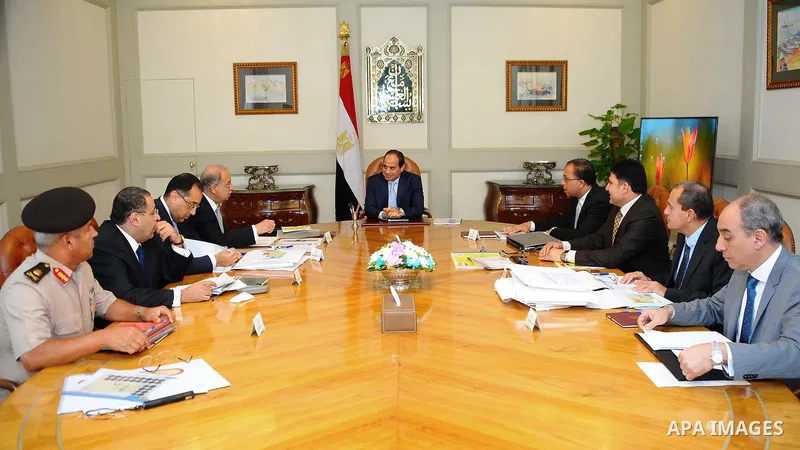 Egyptian President Abdel Fattah el-Sisi meets with Prime minister Sherif Ismail, in cairo on October 18, 2015. Photo by Egyptian President Office