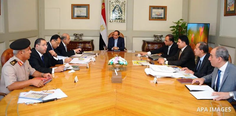 Egyptian President Abdel Fattah el-Sisi meets with Prime minister Sherif Ismail, in cairo on October 18, 2015. Photo by Egyptian President Office