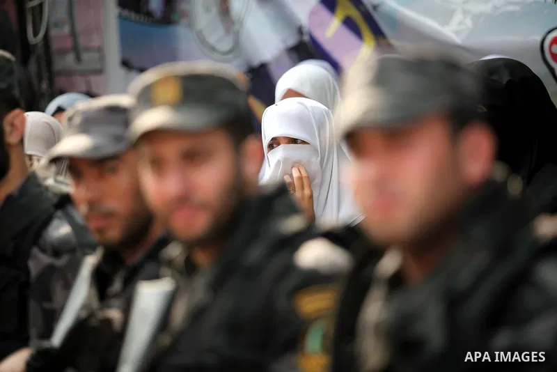 Palestinian policemen take part in a protest demanding release the prisoners in Israeli jails, in front of Red cross office, in Gaza city, on Oct. 19, 2015. Photo by Ashraf Amra