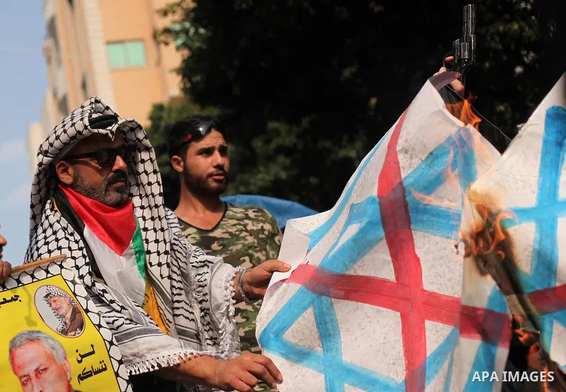 Palestinians take part in an anti-Israel protest in front of Red cross office, in Gaza city, on Oct. 19, 2015. Israel pressed ahead with major security measures after five more stabbing incidents, while ultra-Orthodox Je...