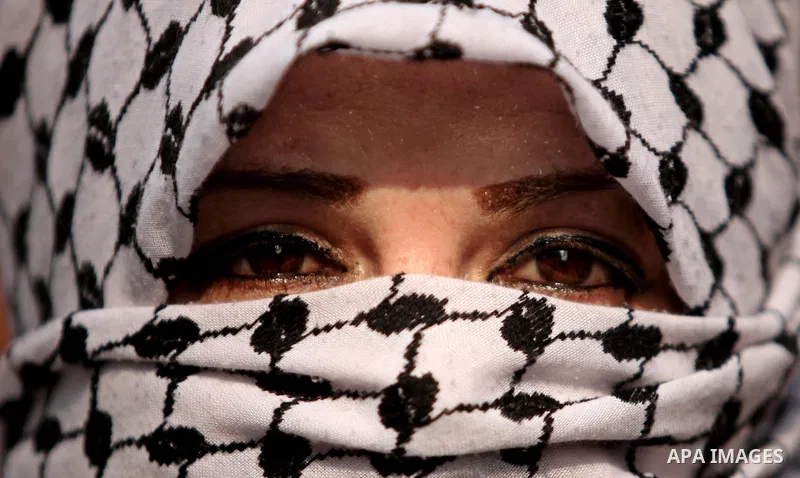 A Palestinian woman takes part in an anti-Israel protest in front of Red cross office, in Gaza city, on Oct. 19, 2015. Israel pressed ahead with major security measures after five more stabbing incidents, while ultra-Ort...