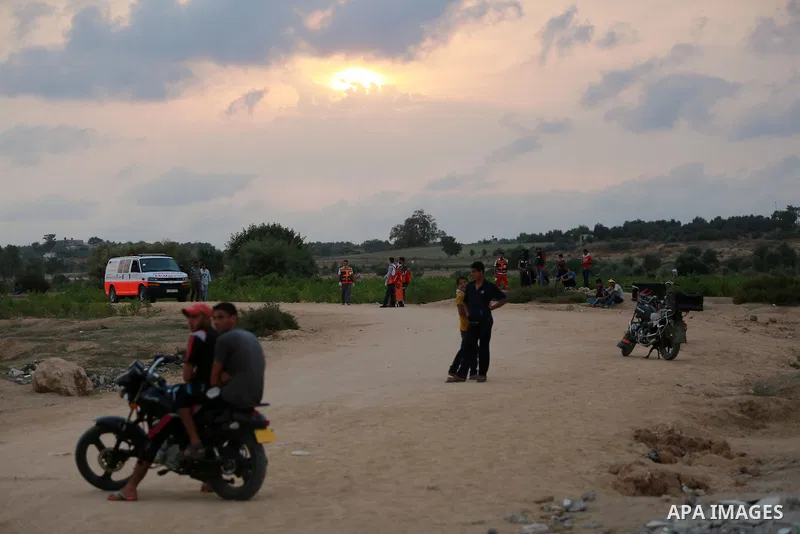Palestinian protesters clash with Israeli troops near the border between Israel and Central Gaza Strip October 19, 2015. More than two weeks of unrest have raised warnings of the risk of a full-scale Palestinian uprising...