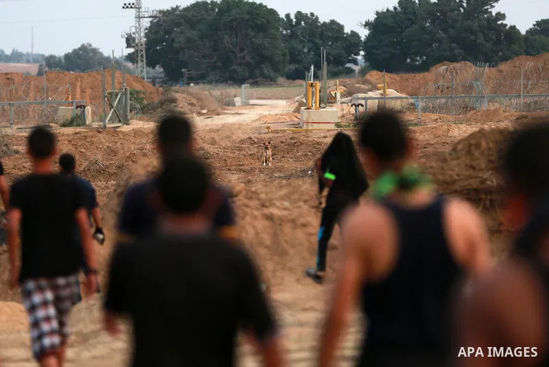 Palestinian protesters clash with Israeli troops near the border between Israel and Central Gaza Strip October 19, 2015. More than two weeks of unrest have raised warnings of the risk of a full-scale Palestinian uprising...