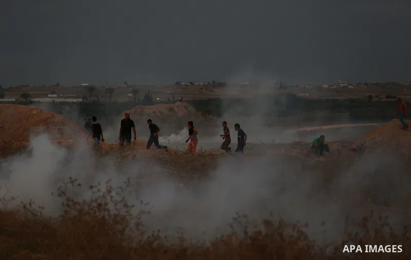Palestinian protesters clash with Israeli troops near the border between Israel and Central Gaza Strip October 19, 2015. More than two weeks of unrest have raised warnings of the risk of a full-scale Palestinian uprising...