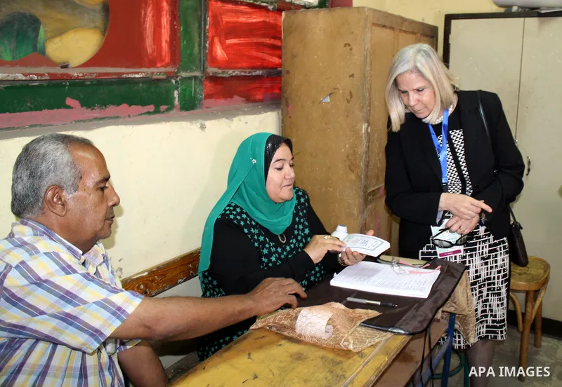 Haifa Abu Ghazaleh President of the Arab League mission to follow up the parliamentary elections in Egypt, inspects a polling center, in Cairo on October 27, 2015. Turnout for the first round of voting held in 14 of Egyp...