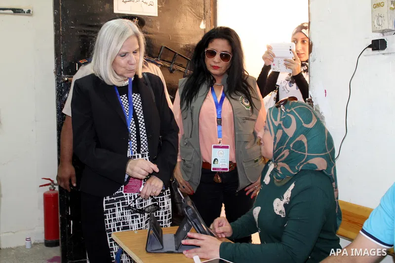 Haifa Abu Ghazaleh President of the Arab League mission to follow up the parliamentary elections in Egypt, inspects a polling center, in Cairo on October 27, 2015. Turnout for the first round of voting held in 14 of Egyp...