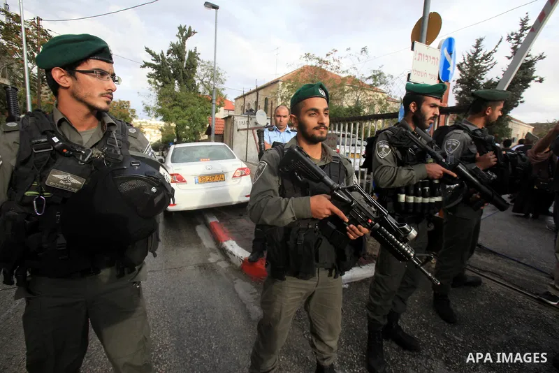 Israeli policemen stand outside a Jerusalem court, where is lader of the radical northern wing of the Islamic Movement in Israel, Sheikh Raed Salah was convicted on October 27, 2015. An Israeli court upheld a conviction...