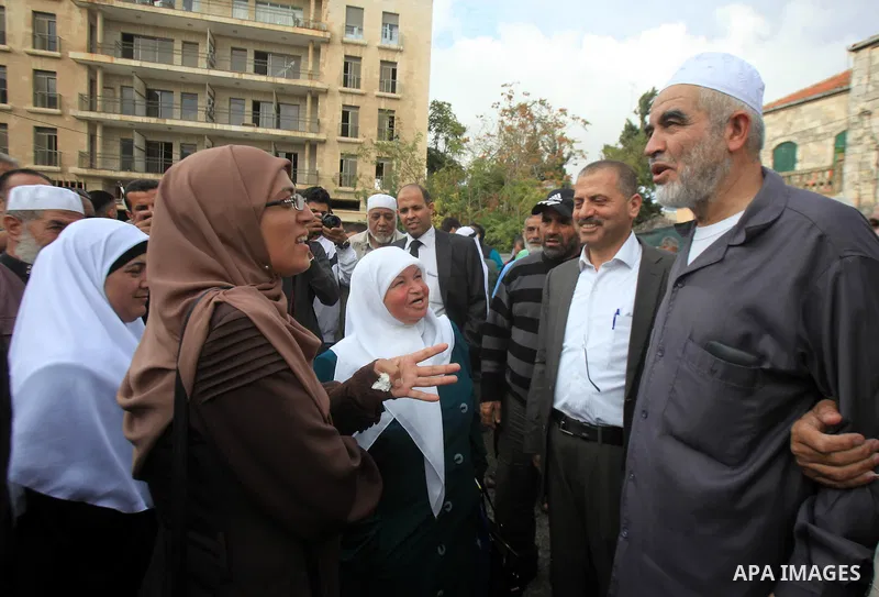 Leader of the radical northern wing of the Islamic Movement in Israel, Sheikh Raed Salah, speaks to supporters outside a Jerusalem court after he was convicted on October 27, 2015. An Israeli court upheld a conviction of...