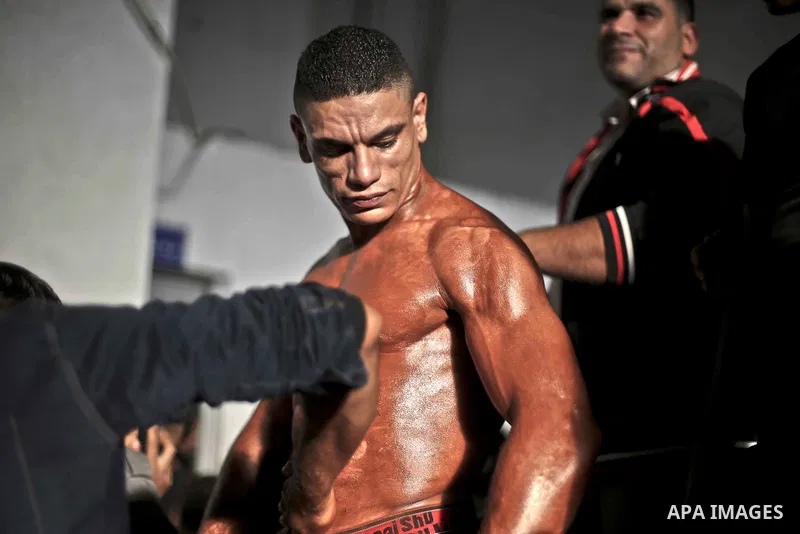A Palestinian contestant takes part in a local bodybuilding championship in Gaza City October 30, 2015. Photo by Mohammed Talatene