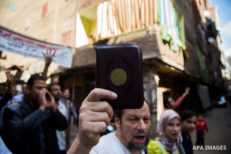 Egyptian supporters of Muslim Brotherhood shot slogans during a demonstration in support of deposed President Mohamed Morsi, in Giza near Cairo, November 6, 2015. Photo by Amr Sayed