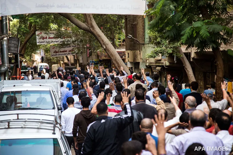 Egyptian supporters of Muslim Brotherhood shot slogans during a demonstration in support of deposed President Mohamed Morsi, in Giza near Cairo, November 6, 2015. Photo by Amr Sayed
