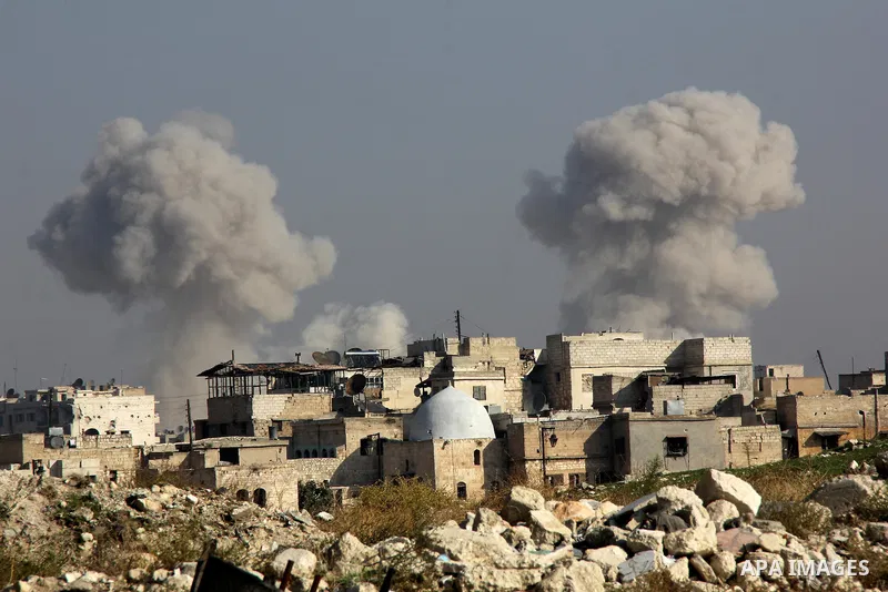 Smoke billows following a reported airstrike by government forces next to the Aleppo Citadel in the northern Syrian city on November 7, 2015. More than 250,000 people have died in Syria's conflict, which several rounds o...