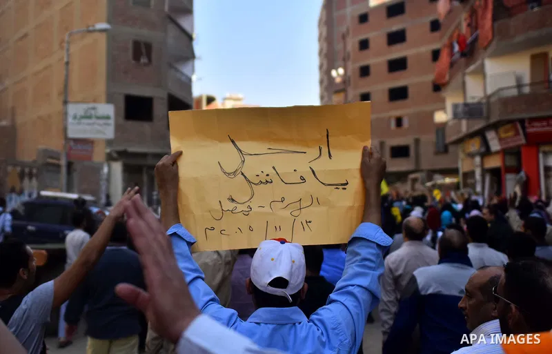 Egyptian supporters of Muslim Brotherhood and deposed President Mohamed Morsi, shot slogans during a demonstration against the President Abdel Fattah al-Sisi in Giza near Cairo, November 13, 2015. Photo by Amr Sayed