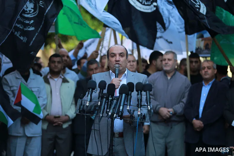 Palestinian Hamas supporters take part in a protest against the killing in twin suicide attacks 12 November in the Bourj al-Barajneh suburb of Beirut, in Gaza city on November 13, 2015. Photo by Stringer