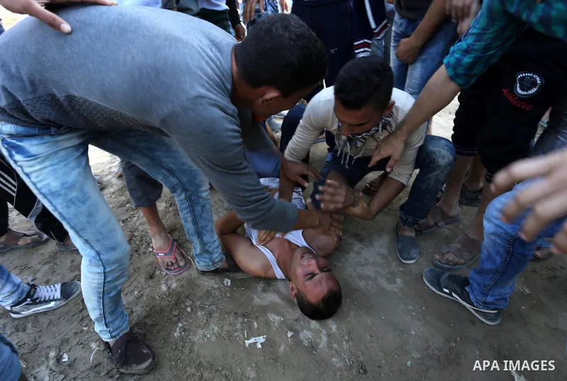 Palestinian protesters take part in clashes with Israeli security forces near the border between Israel and eastern Gaza city, November 13, 2015. The current wave of violence erupted in mid-September, fueled by rumors th...