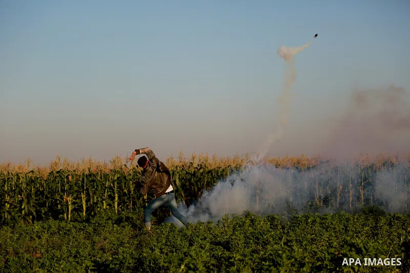 Palestinian protesters take part in clashes with Israeli security forces near the border between Israel and eastern Gaza city, November 13, 2015. The current wave of violence erupted in mid-September, fueled by rumors th...