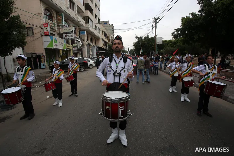 Palestinian scouts play music during a march to mark the 27th anniversary of the Palestinian Independence Day, in Gaza city, on Nov. 15, 2015. Palestinians have marked Nov. 15 as their Independence Day since 1988 when th...