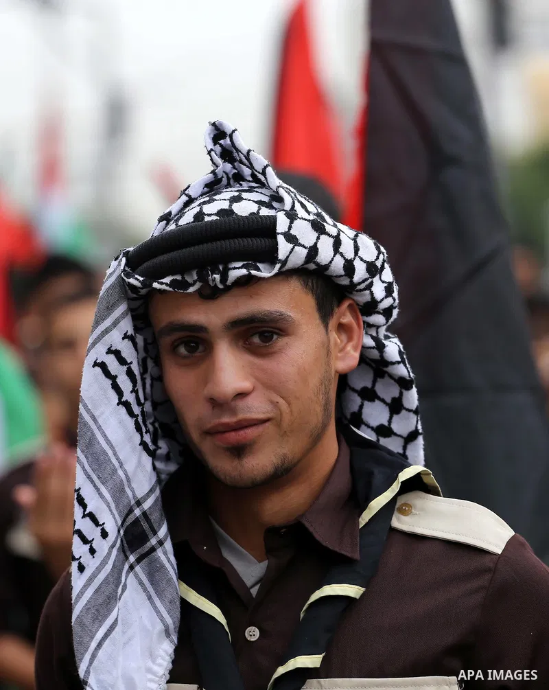 Palestinian scouts play music during a march to mark the 27th anniversary of the Palestinian Independence Day, in Gaza city, on Nov. 15, 2015. Palestinians have marked Nov. 15 as their Independence Day since 1988 when th...