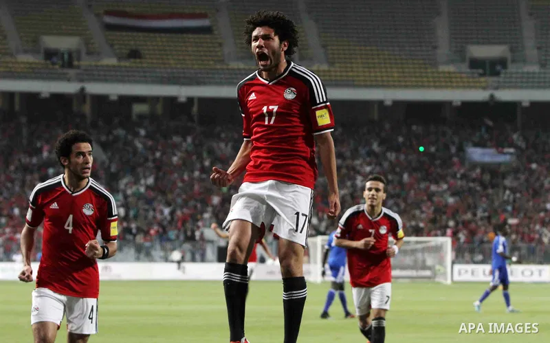 Egypt's players celebrate after Ahmed Hassan "Koka" scored a goal during their 2018 World Cup qualifying soccer match against Chad at Borg El Arab "Army Stadium" in the Mediterranean city of Alexandria, north of Cairo, E...