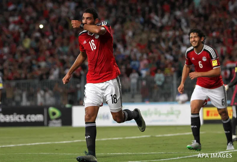 Egypt's players celebrate after Ahmed Hassan "Koka" scored a goal during their 2018 World Cup qualifying soccer match against Chad at Borg El Arab "Army Stadium" in the Mediterranean city of Alexandria, north of Cairo, E...