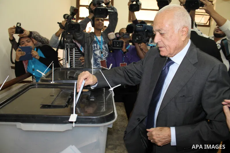 Arab League Secretary-General Nabil Elaraby casts his vote at a polling station, on the second day of the final round of the country's parliamentary elections, in the capital Cairo on November 23, 2015. Egyptians are vot...