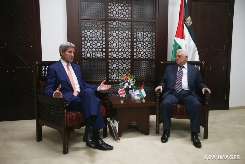 Palestinian President Mahmoud Abbas (R) meets with US Secretary of State John Kerry (L) at Abbas's Headquarter in the West Bank city of Ramallah, November 24, 2015. Kerry is on his first visit to Israel and the West Bank...