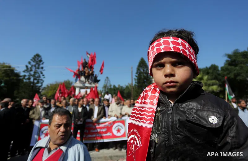 Palestinian supporters of Democratic Front for the Liberation of Palestine (DFLP) take part in International Day of Solidarity with the Palestinian People, in Gaza City, on November 29, 2015. Photo by Mohammed Asad