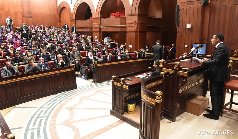 Egyptian students of Cairo University attend a simulation meeting of members of Parliament, at Cairo University on November 30, 2015. Photo by Stringer