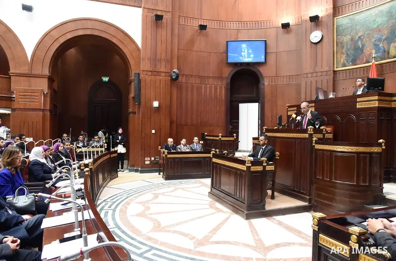 Egyptian students of Cairo University attend a simulation meeting of members of Parliament, at Cairo University on November 30, 2015. Photo by Stringer