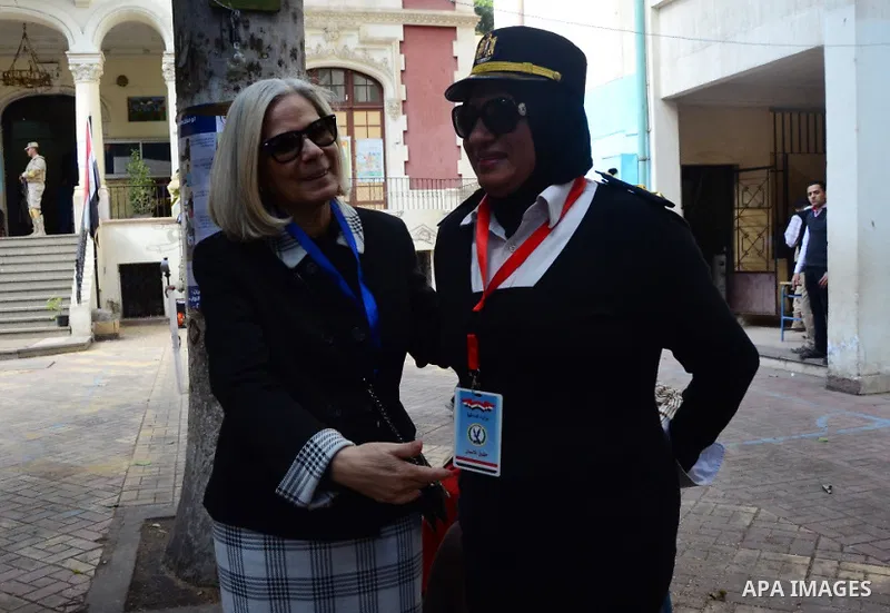 Haifa Abu Ghazaleh President of the Arab League mission to follow up the parliamentary elections in Egypt, inspects a polling station during the run-off in the second phase of Egypt's parliamentary elections in the capit...