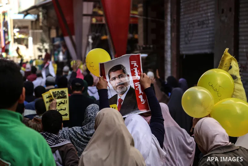 Egyptian supporters of Muslim Brotherhood and deposed President Mohamed Morsi, shot slogans during a demonstration against the President Abdel Fattah al-Sisi in Giza near Cairo, Dec. 04, 2015. Photo by Amr Sayed