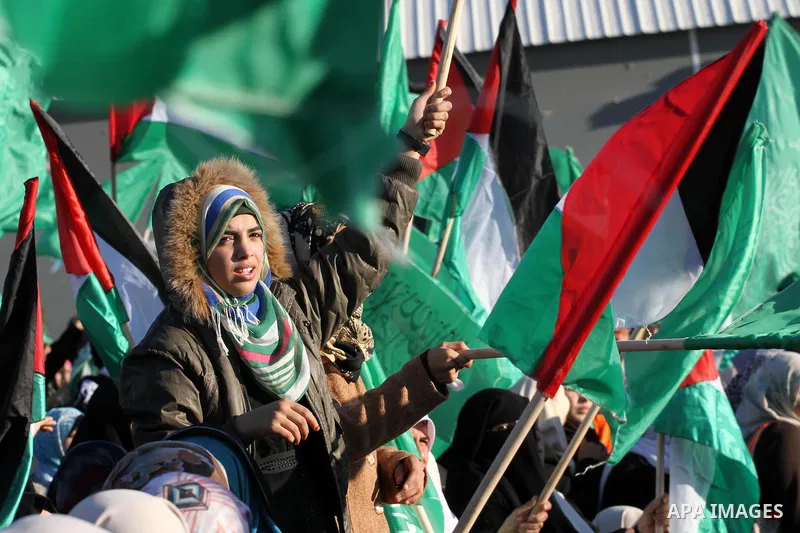 Palestinian women take part during a rally in Gaza City December 6, 2015 in support of Palestinian stabbing attacks against Israelis. Israeli forces on Sunday detained a Palestinian schoolgirl who was allegedly carrying...