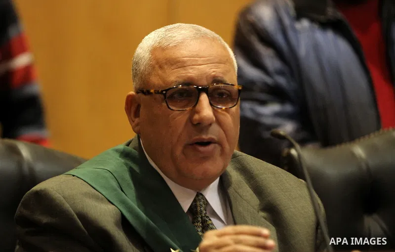 An Egyptian Judge attend the trial of Egyptian Muslim Brotherhood leader Mohammed Badie at a court in the outskirts of Cairo, Egypt, Dec. 07, 2015. Photo by Amr Sayed